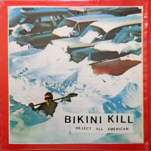 Cover of vinyl record REJECT ALL AMERICAN - (COLOR VINYL) by artist BIKINI KILL